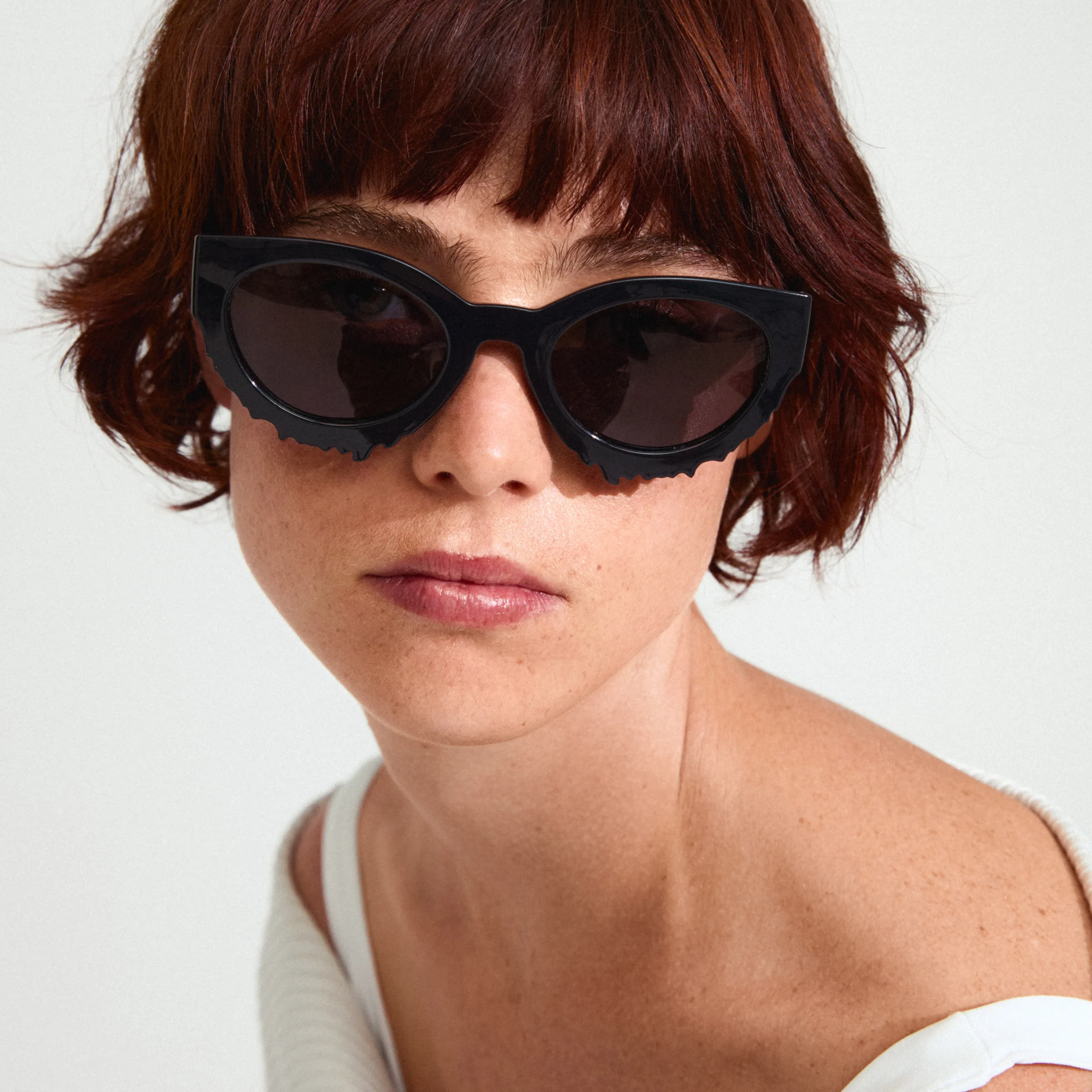 7 Classic Black Sunglasses Styles That Transform Women with Short Hair